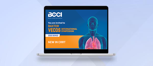 Apple laptop showing an image of the Vecos invitation